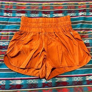 FP Movement by Free People Vibrant Orange Athletic Shorts